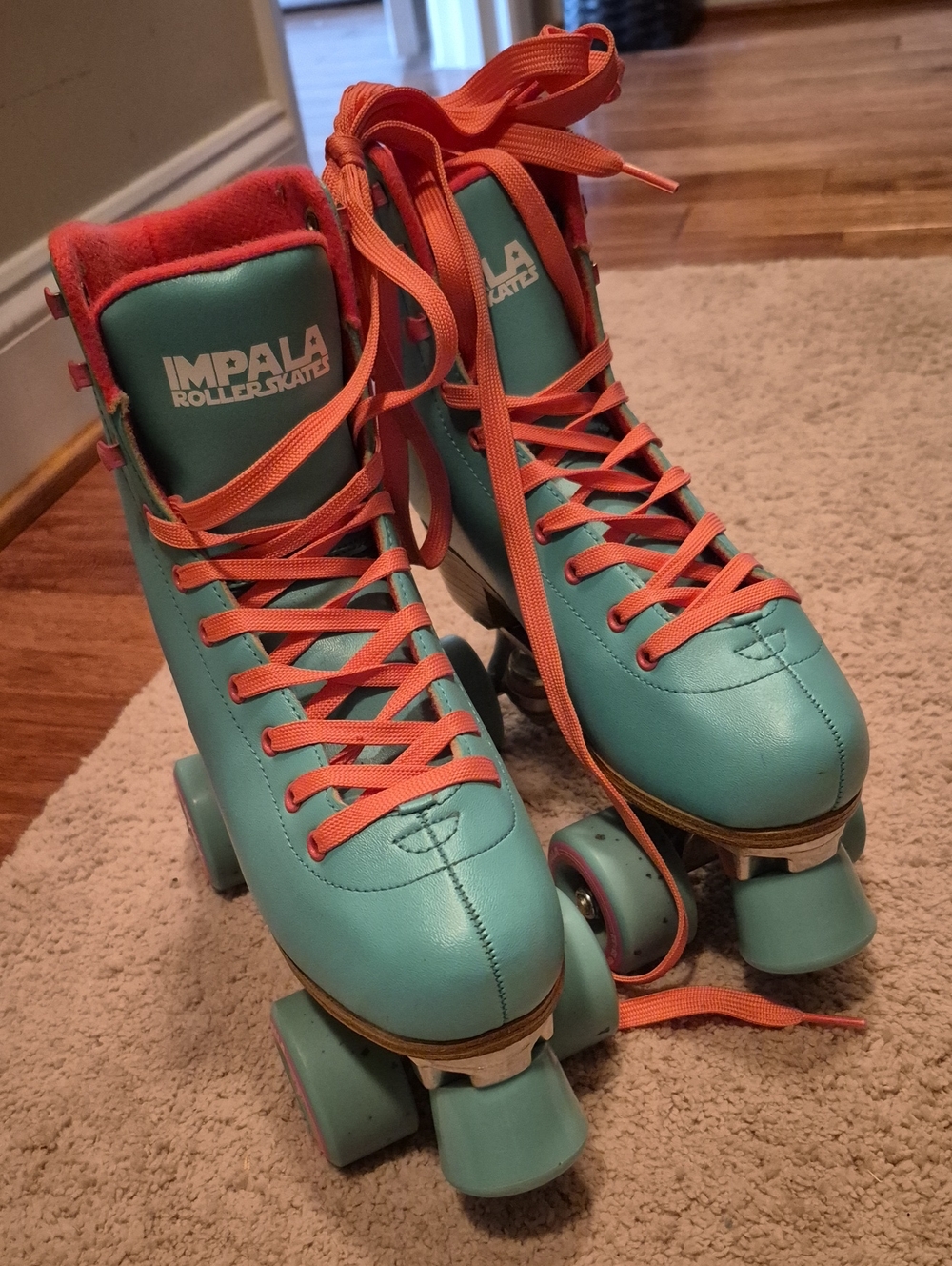 Impala Teal Roller Skates with Coral Laces